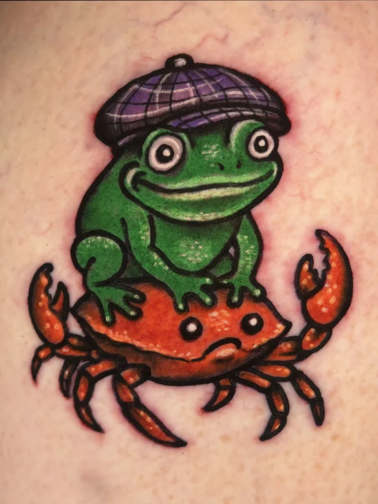 American Traditional frog riding a crab tattoo by Josh at Electric Street Tattoo, Fort Lauderdale