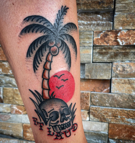 American Traditional palm tree, skull and red sun tattoo by Josh at Electric Street Tattoo, Fort Lauderdale