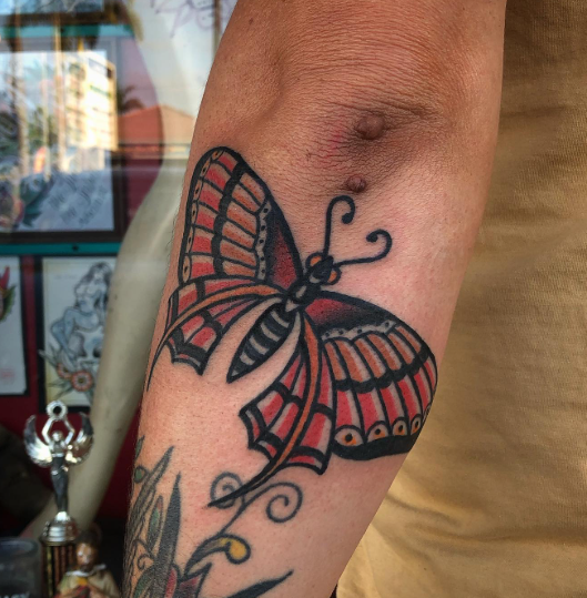American Traditional moth tattoo by Josh at Electric Street Tattoo, Fort Lauderdale