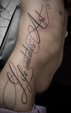 fancy script tattoo