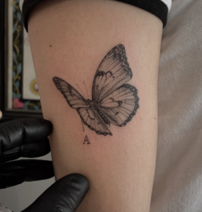 fine line butterfly tattoo