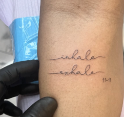 fine line script tattoo