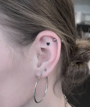 tiny ear tattoo