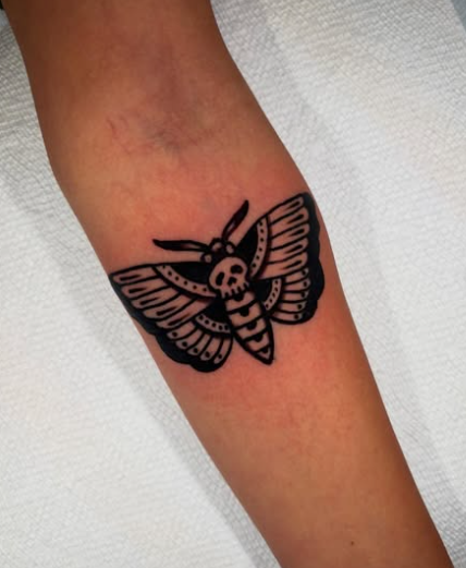 American Traditional moth tattoo by Josh at Electric Street Tattoo, Fort Lauderdale