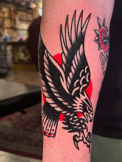 American Traditional black and red eagle tattoo by Josh at Electric Street Tattoo, Fort Lauderdale