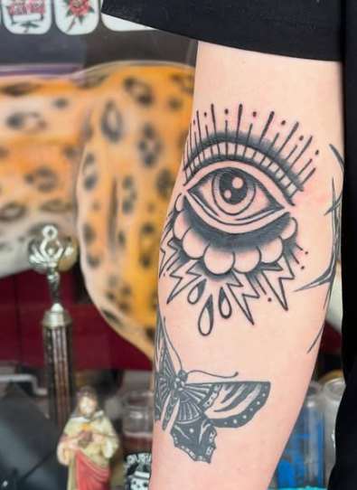 American Traditional all-seeing eye tattoo by Josh at Electric Street Tattoo, Fort Lauderdale