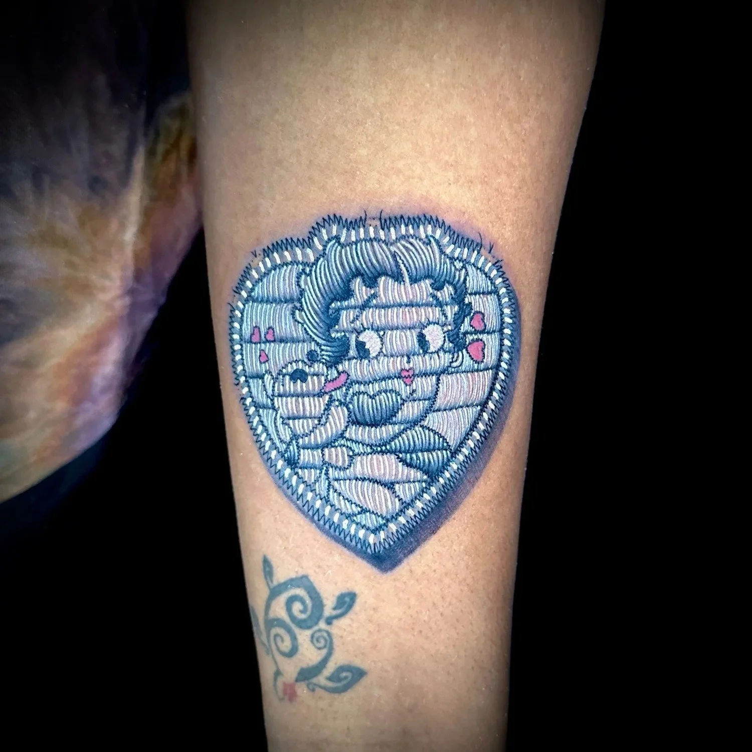 Betty Boop heart-shaped embroidered patch tattoo by CJ Ugarte at Electric Street Tattoo, Fort Lauderdale