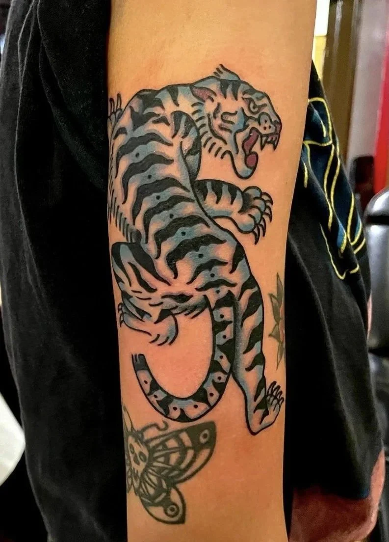 Traditional crawling tiger tattoo at Electric Street Tattoo, Fort Lauderdale