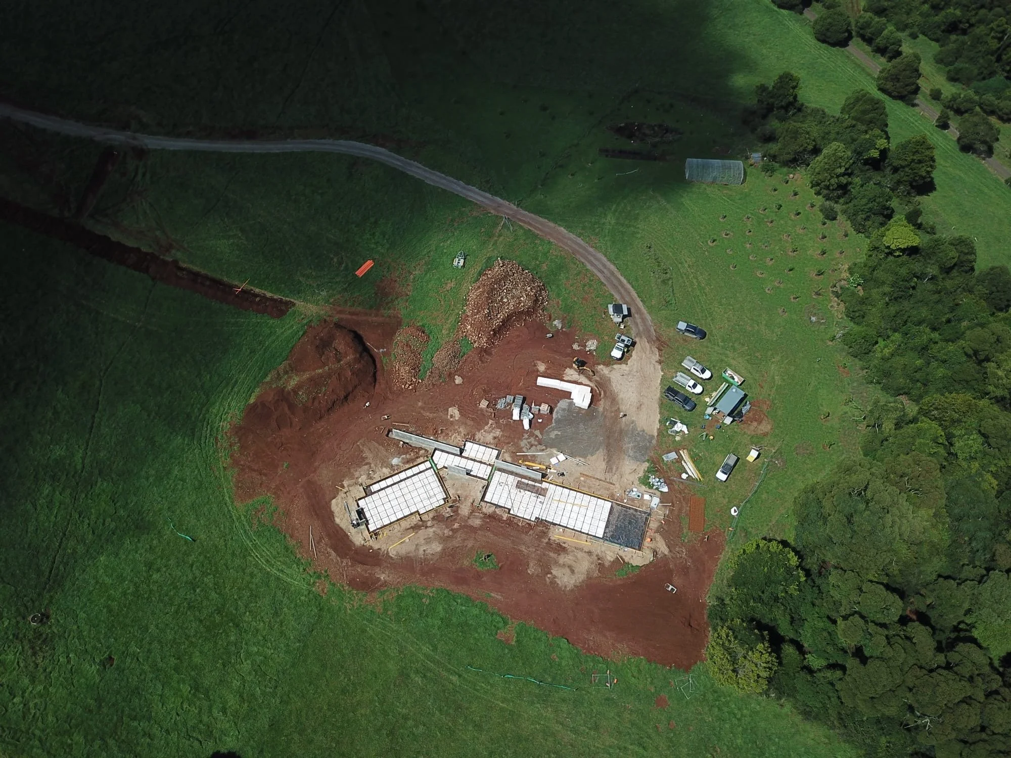 A unique architectural home beginning to rise from the rolling hills of the Southern Highlands.

Pods down, slab set out and services complete and ready for the concrete pour coming up.

Designed by @tziallas_architects 
Builder @northeast.building 
