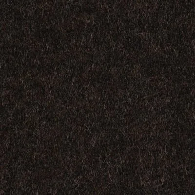 Close-up of a dark brown textured surface, possibly leather or fabric.