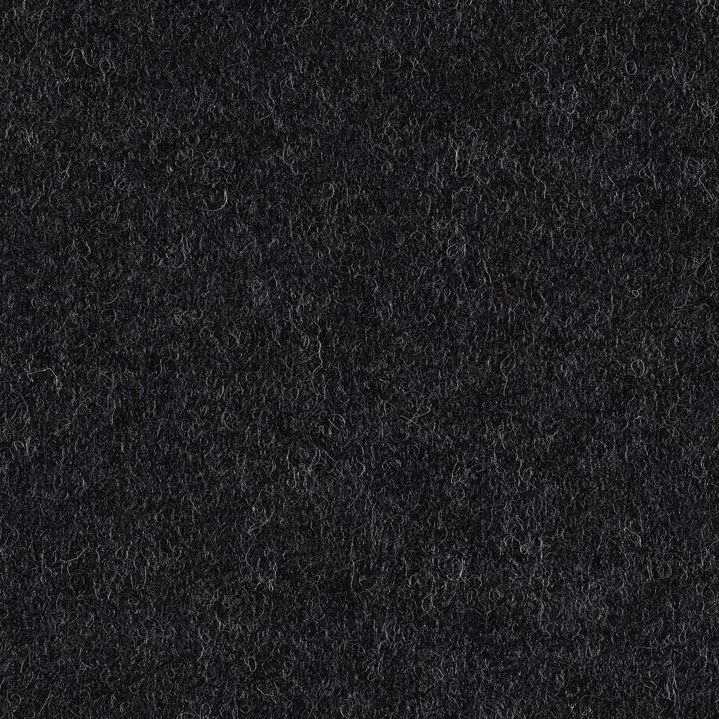 Close-up of black textured fabric or soft material surface.