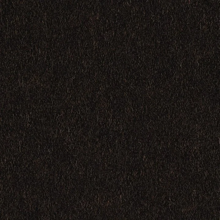 Close-up of black textured surface, possibly fabric or leather