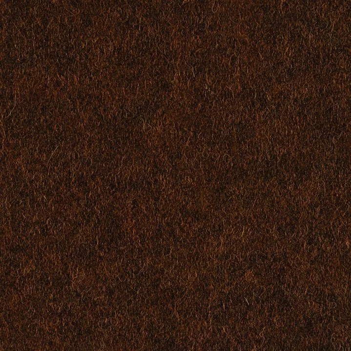 Close-up of brown leather material with textured surface.