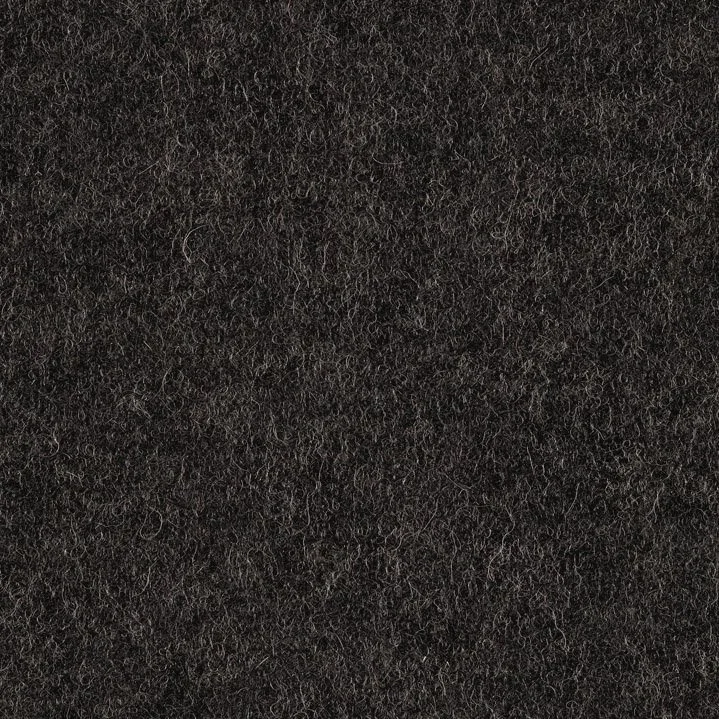 Close-up of black textured fabric or felt surface