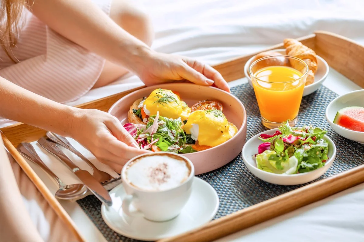 Luxury hotel room service delivered after ordering through a mobile guest platform
