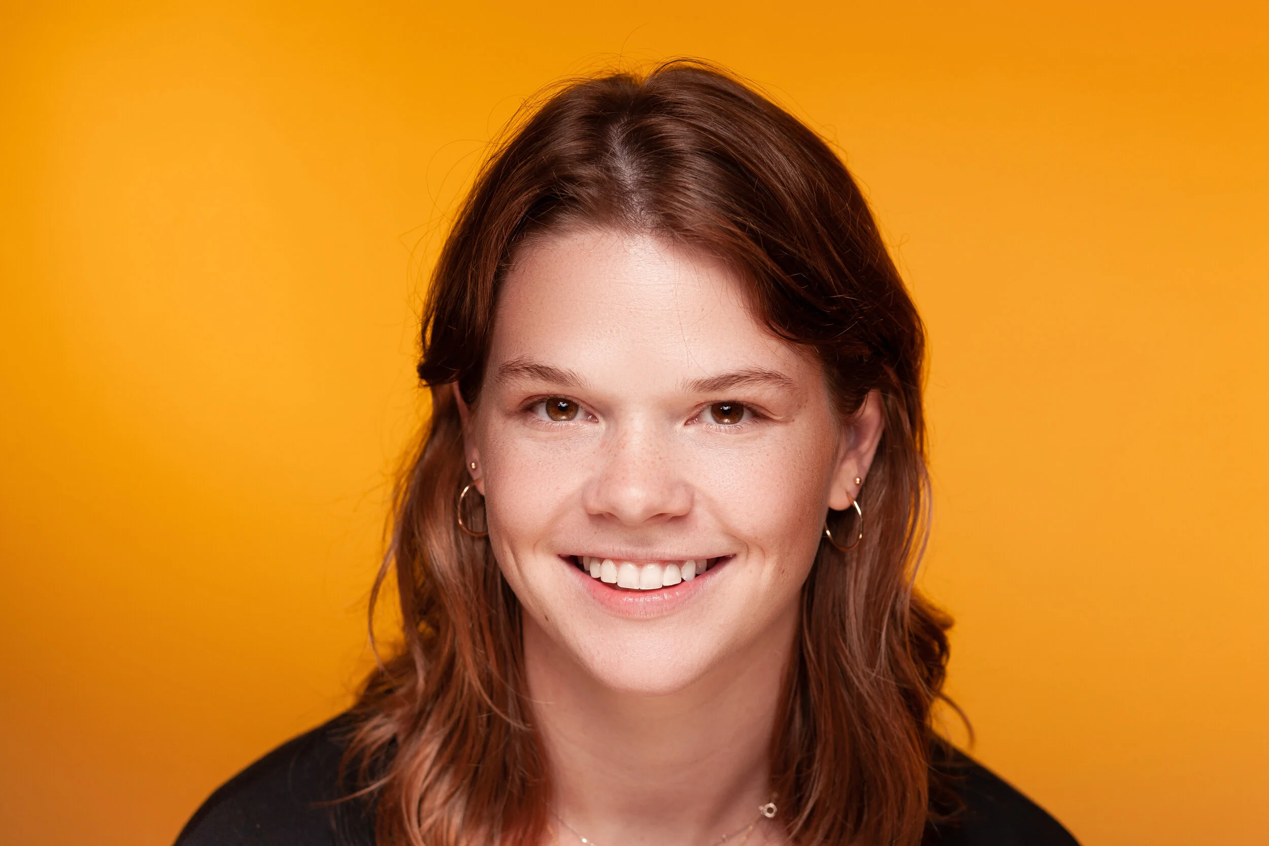kate smile yellow.jpg