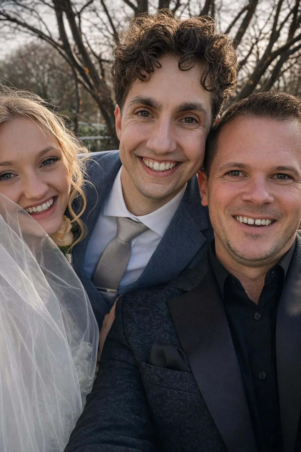 Award-winning pianist Chris Morris at Sandhole Oak Barn wearing a smart black tux, taking a selfie with the happy couple