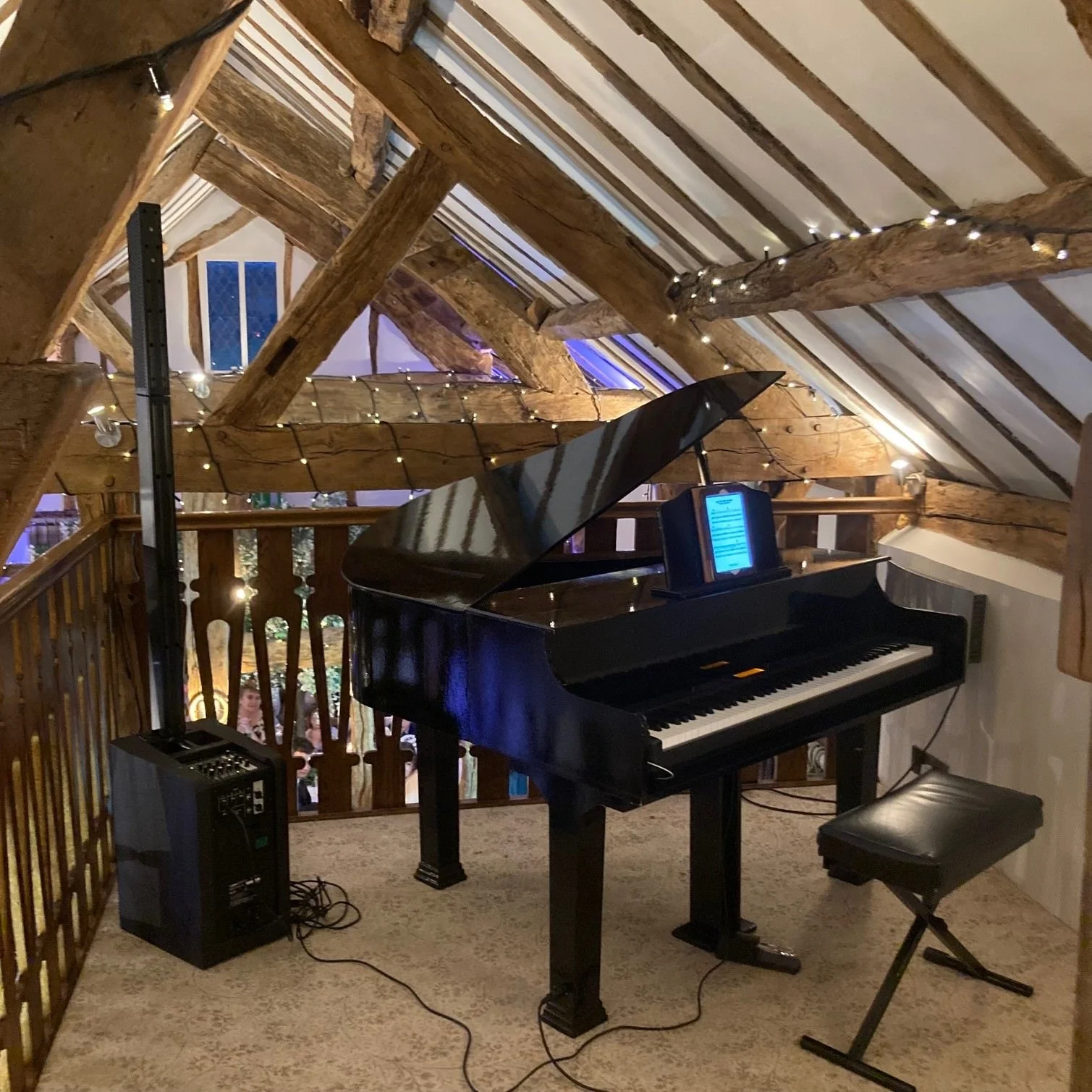 Award-winning wedding pianist, Chris Morris' grand piano setup at the Plough Inn, Eaton