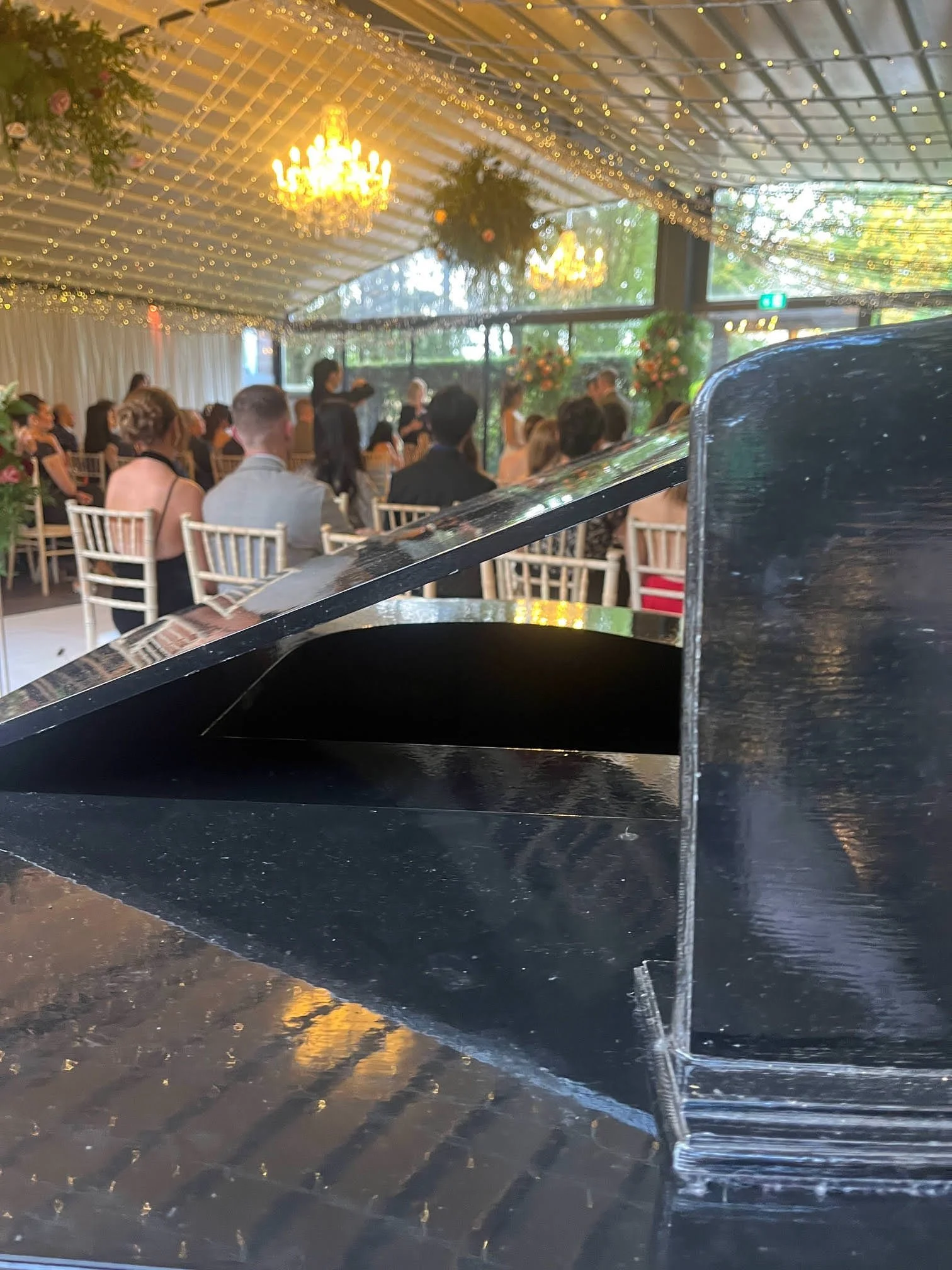 Award winning wedding pianist Chris Morris set up with his grand piano for a wedding ceremony at Delamere Manor