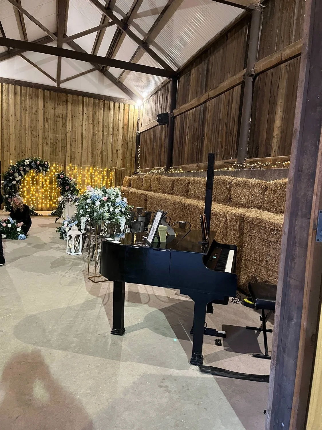 Award winning wedding pianist Chris Morris at The Hayloft for a wedding ceremony with his Grand Piano