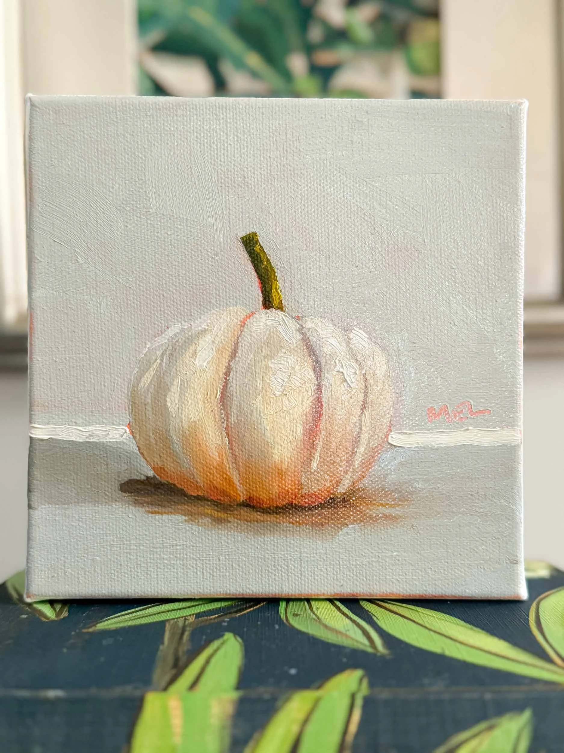 WhitePumpkin-oil-painting-on-books_Mel-Middleton.jpg
