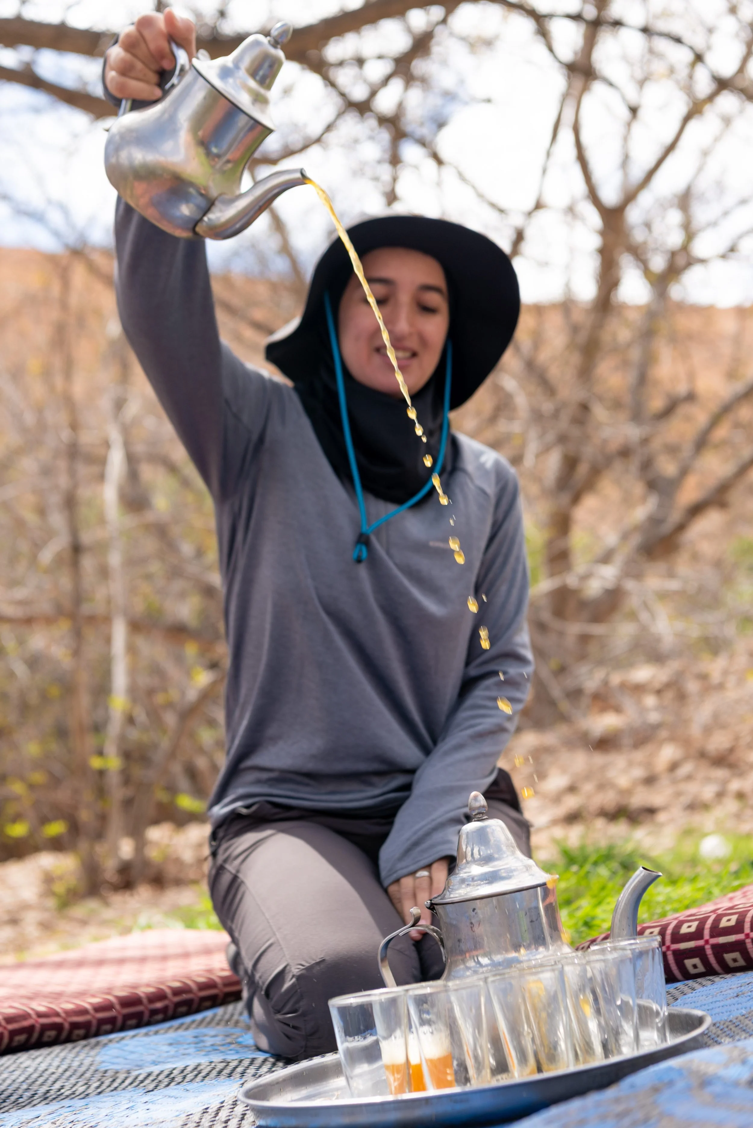 Morocco-Atlas-Trekking-leader-pouring-tea-2.jpeg