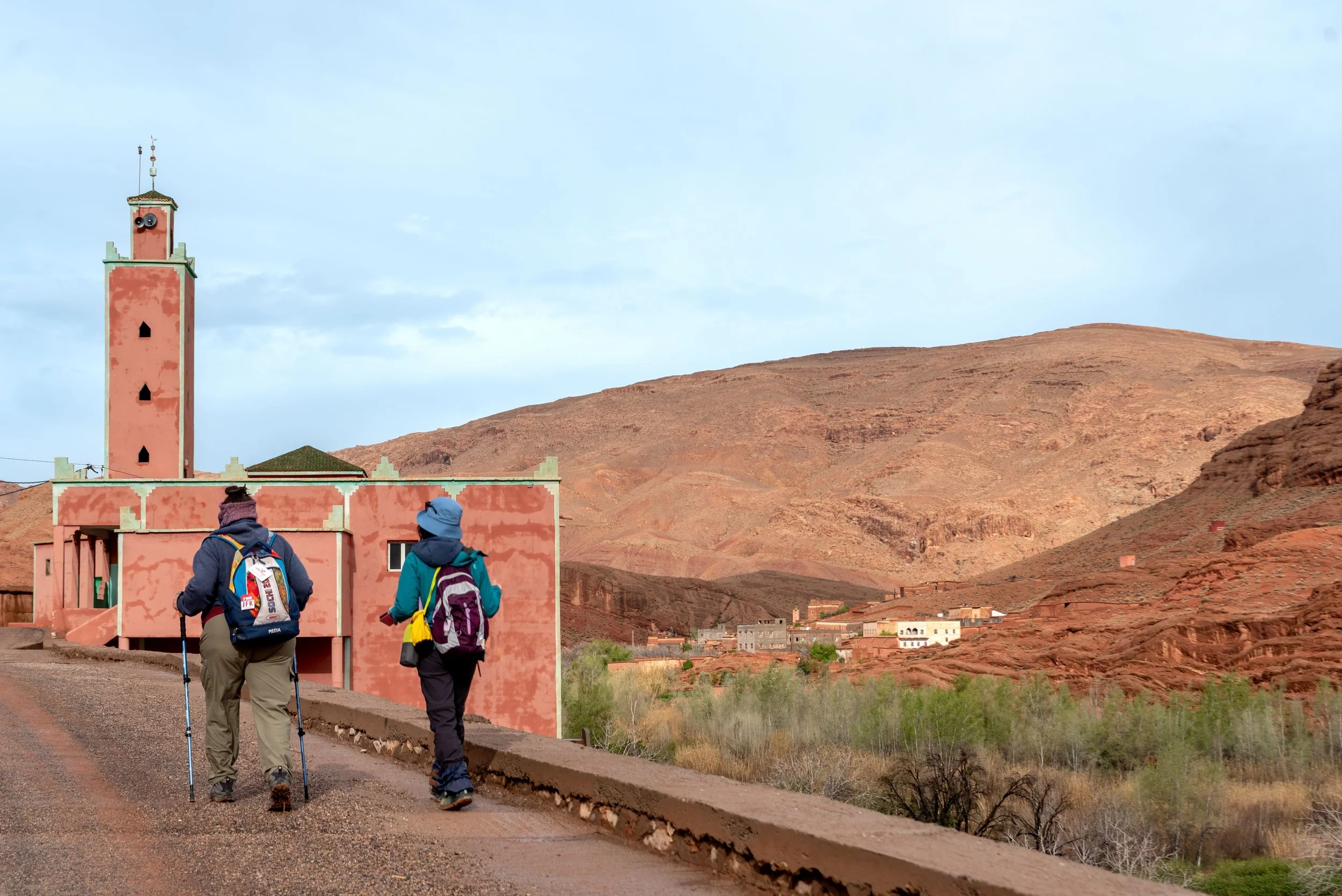 Morocco-Womens-Expedition-travellers-walking-mosque-2.jpeg