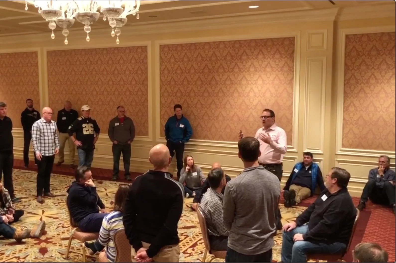 founder, david koff, facilitating a debrief with a corporate training for food and beverage industry executives