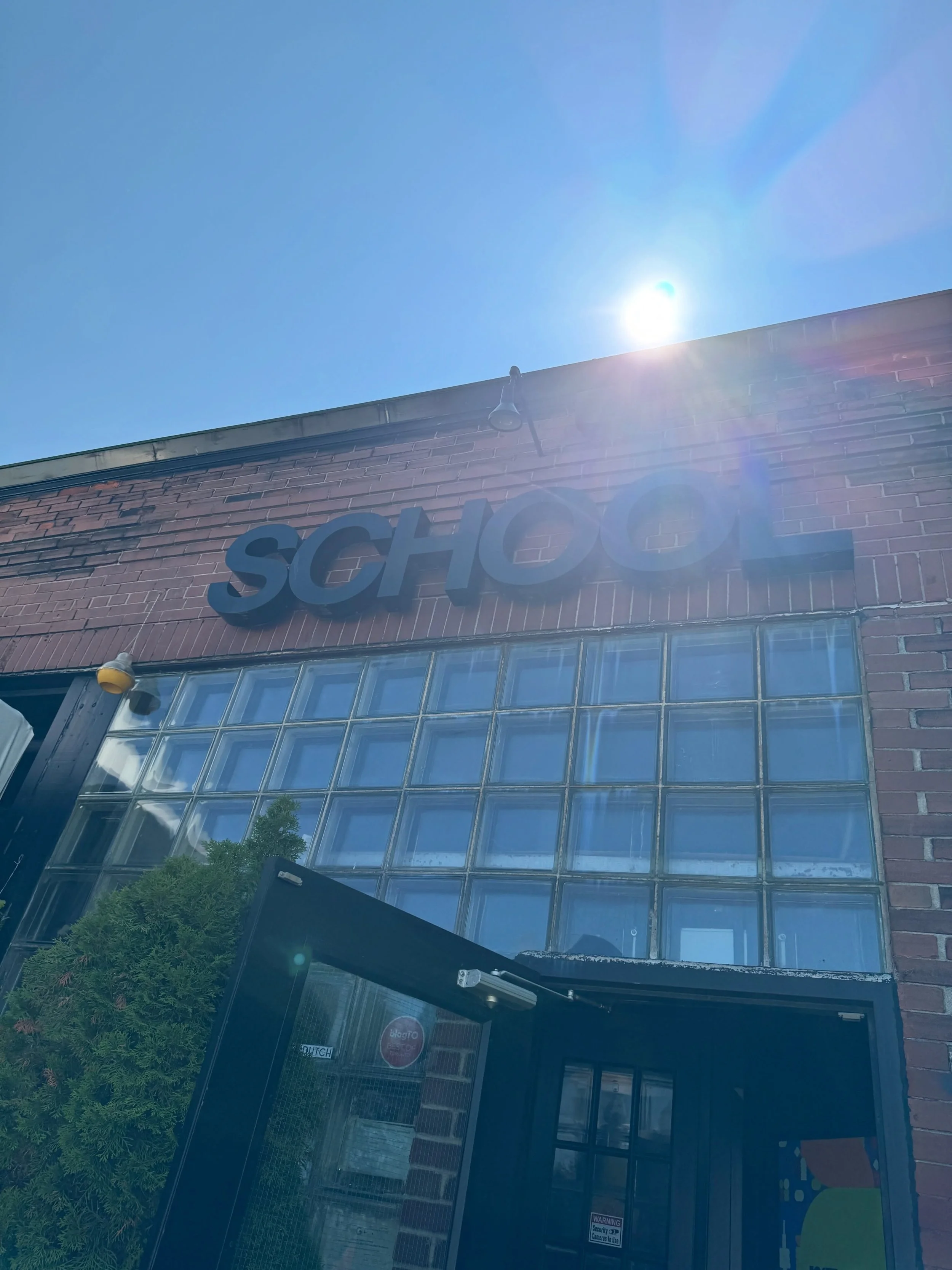 Some brunches start with a craving.

The best ones start the moment you look up. ☀️

Blue skies, open doors, your weekend table and your SCHOOL teacher are all waiting in Liberty Village.

Walk in. We&rsquo;ll take care of the rest. 👩&zwj;🏫 

#libe