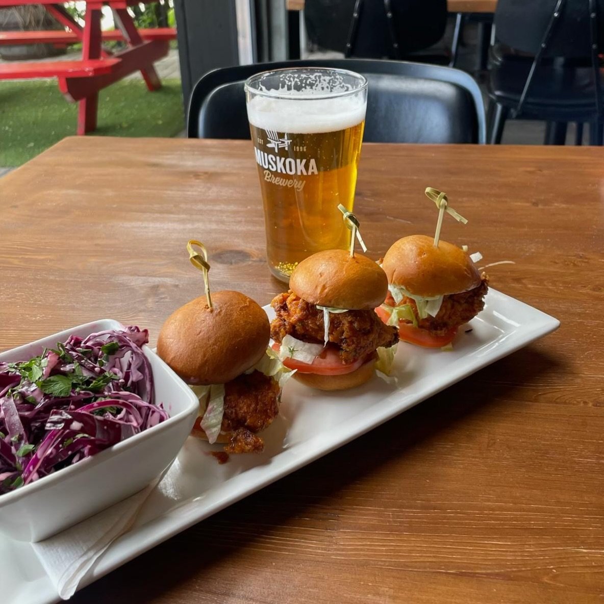 The school lunch your mom packed for you has changed a little since we were kids.. 😏🍔🍺

Crispy chicken sliders, slaw on the side and something cold for the grown-up lunch box.

Slide these sliders into your classmate&rsquo;s DMs. 😌

#schoolrestau