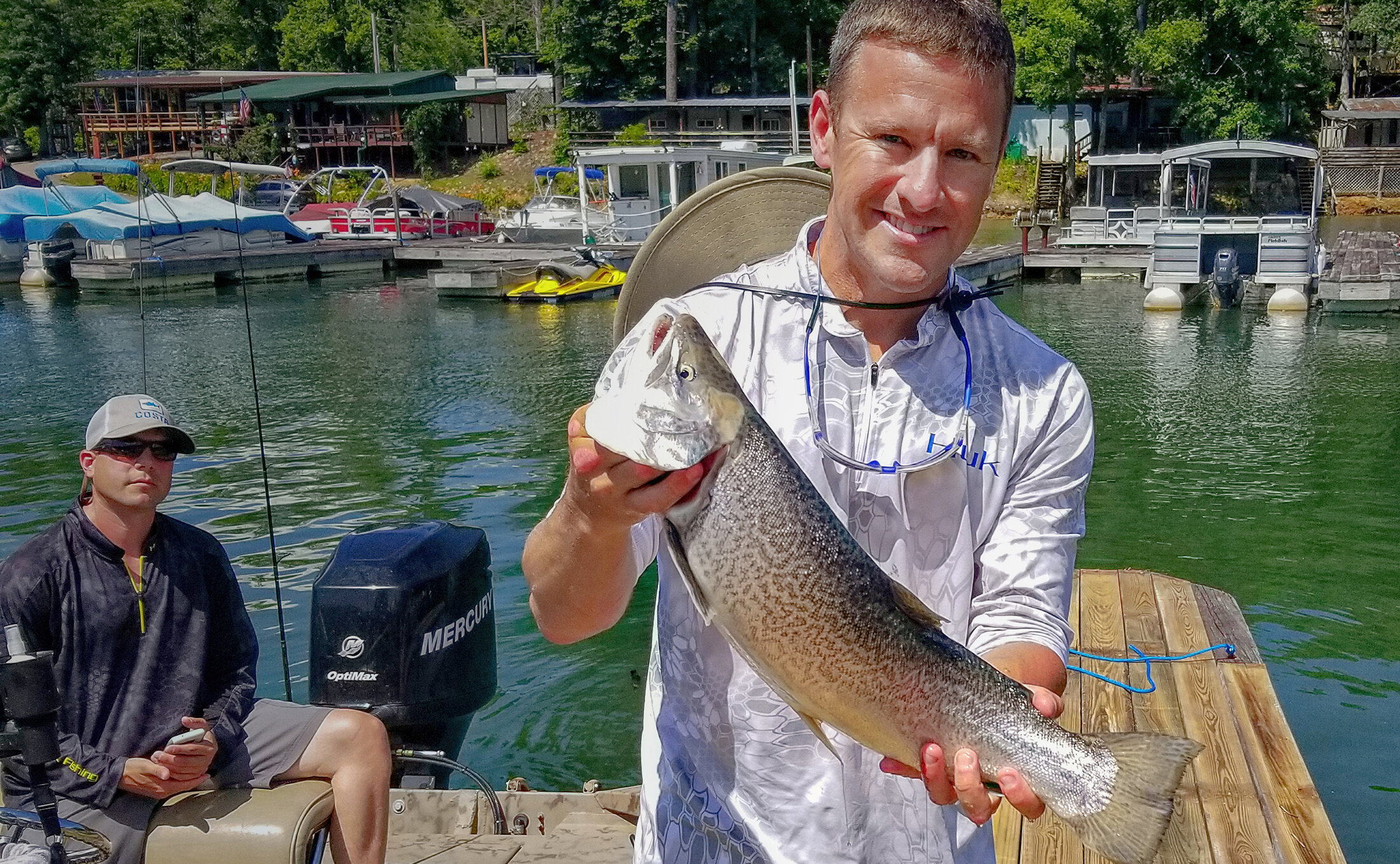 20180616_153130 Man with fish on dockw.jpg