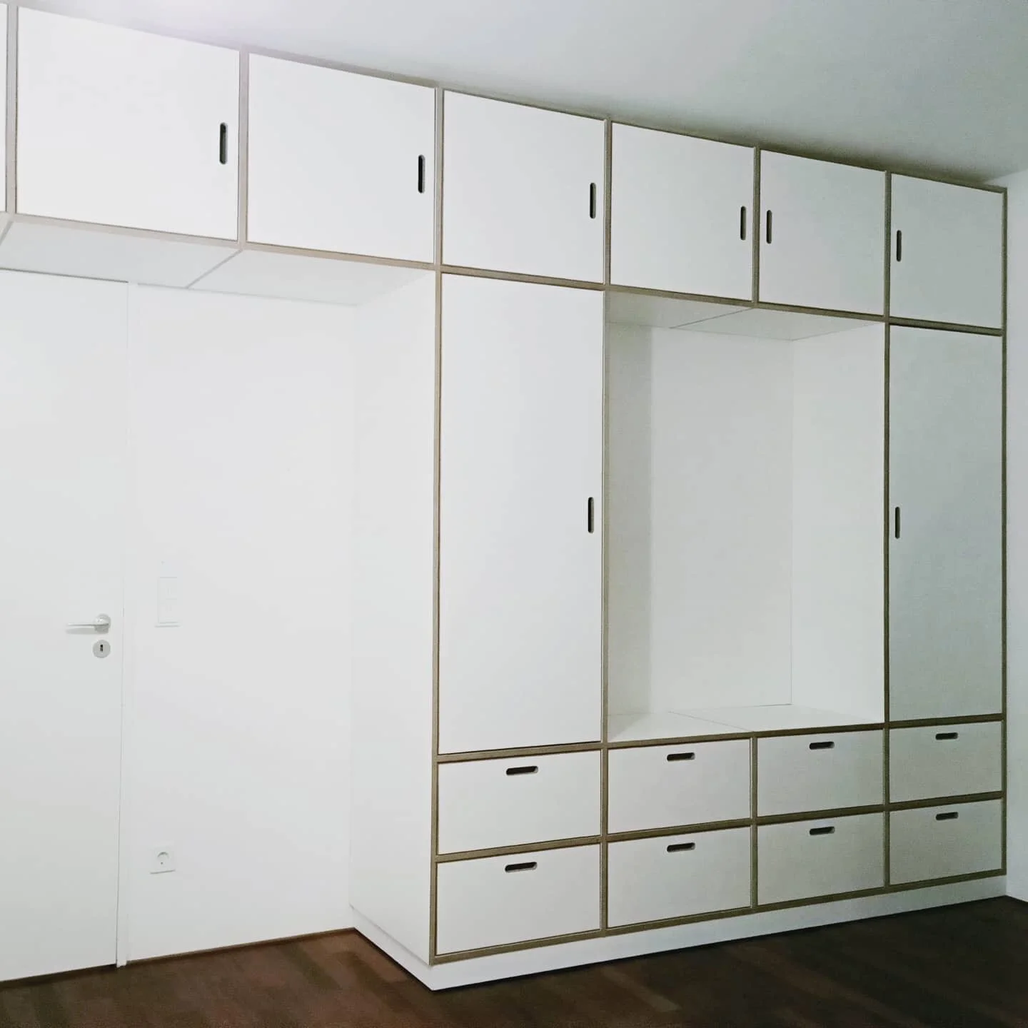 We built this wardrobe/storage unit for a client who needed to store clothing and all sorts of stuff. So we came and designed this beautiful bespoke storage unit.