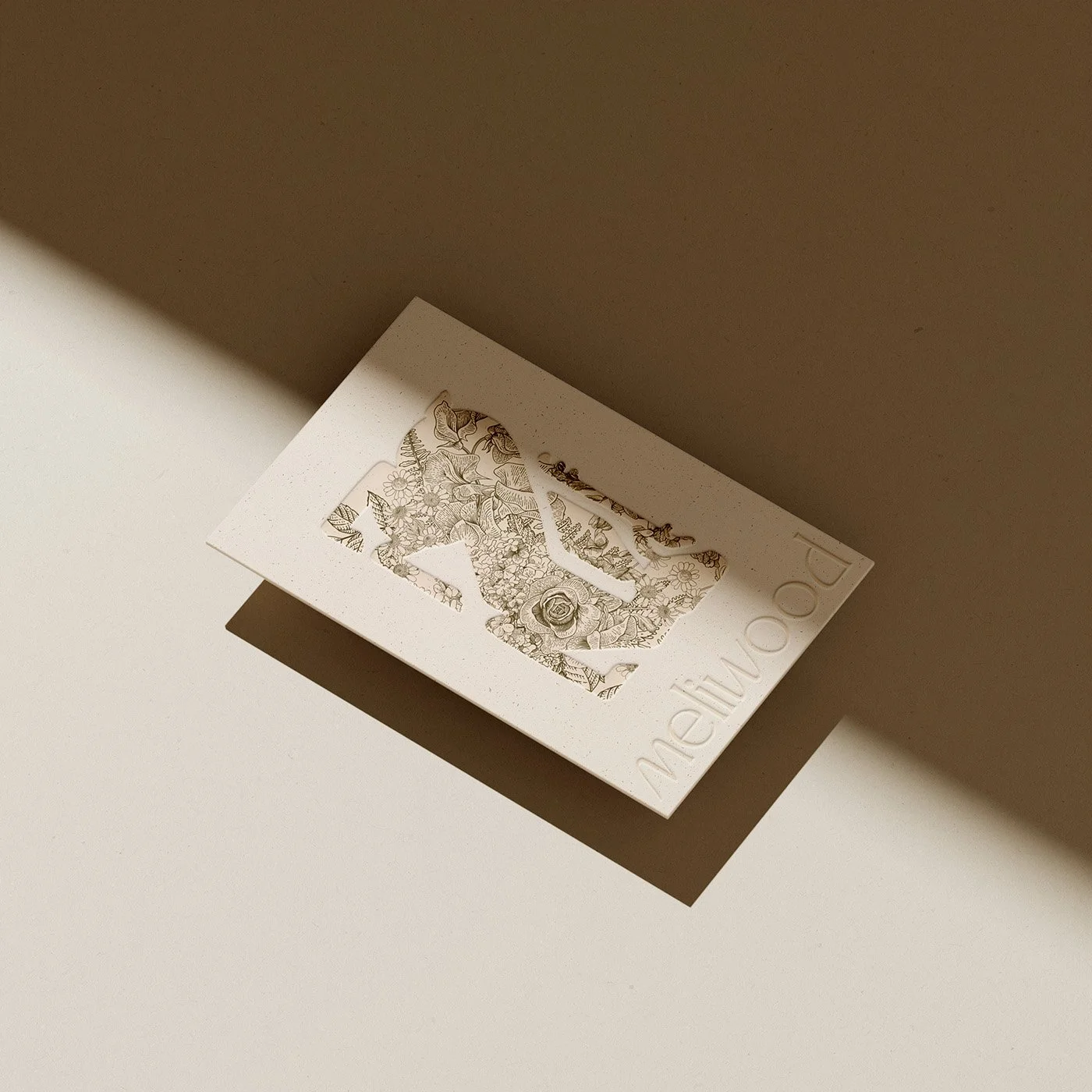 Mockup carte de visite Meliwood imprimée en letterpress — identité visuelle