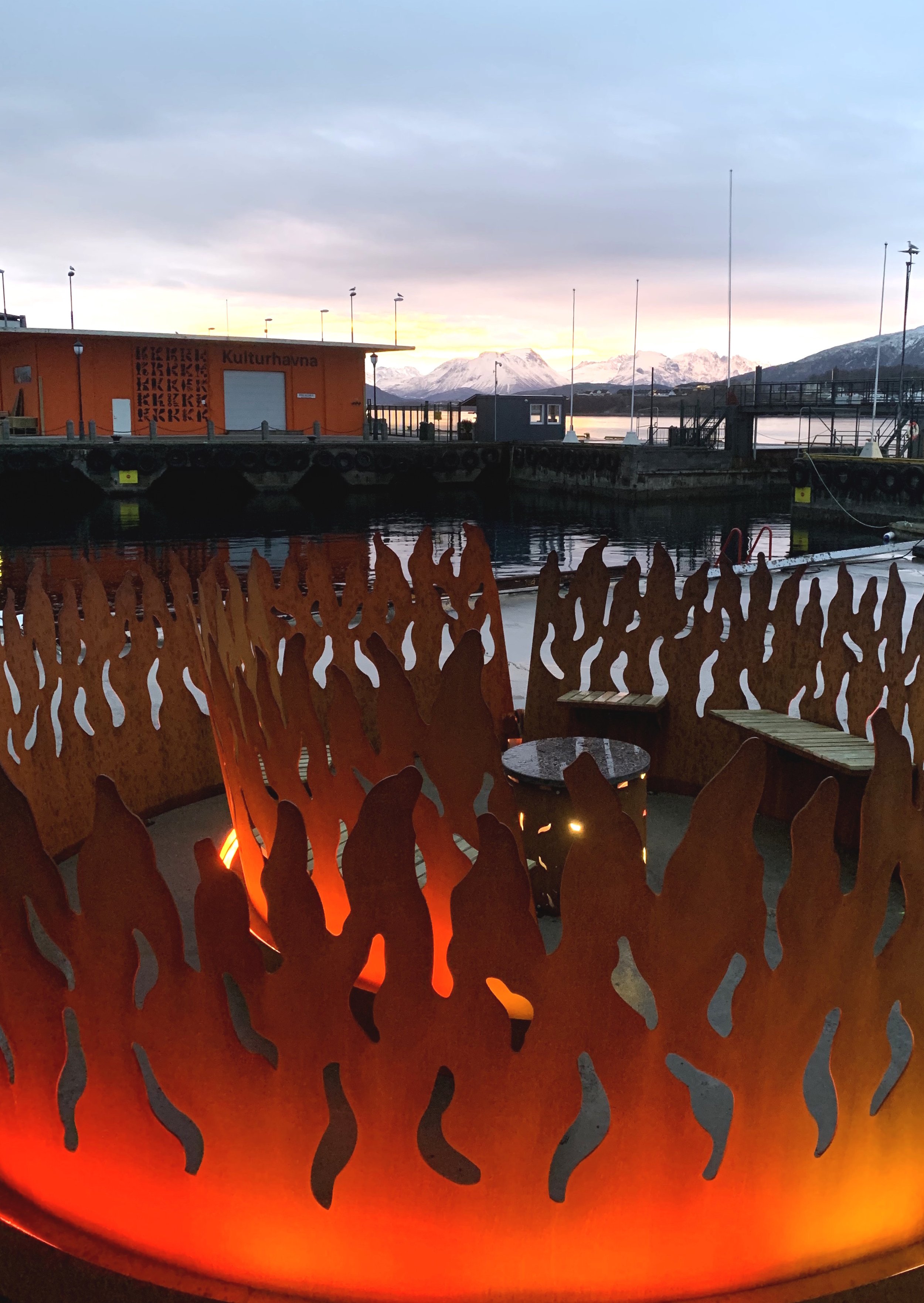 The Bonfire Ålesund at dusk with fjord in the background 1
