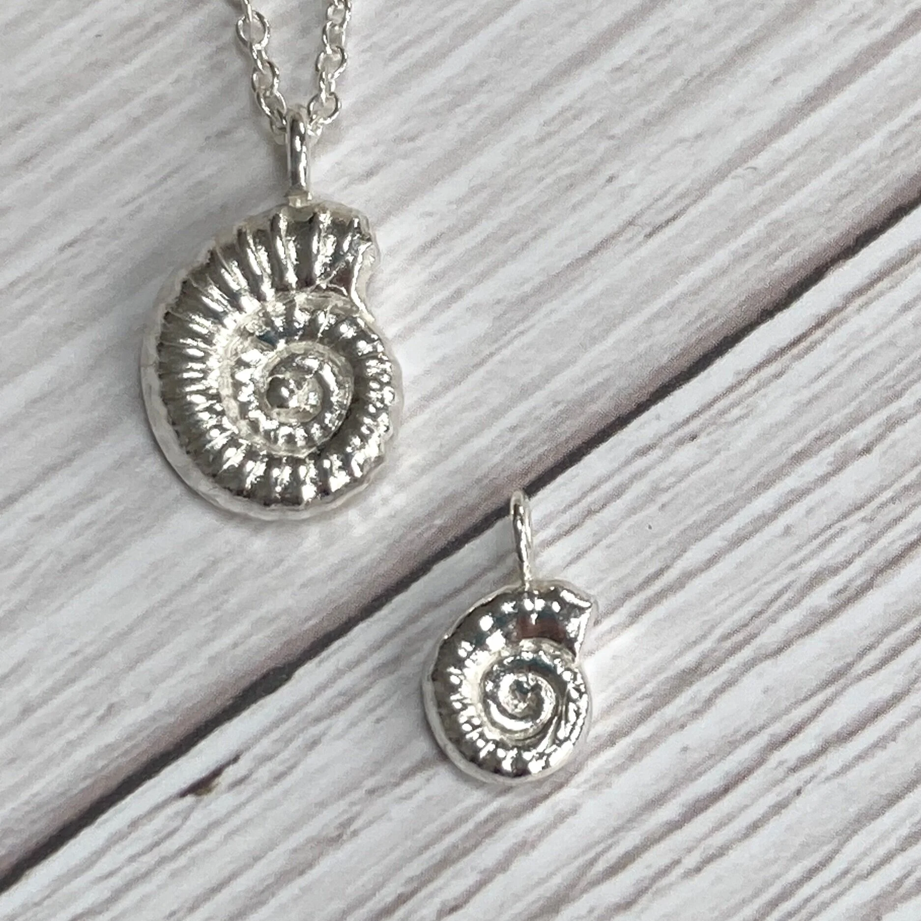 dainty handmade sustainable ammonite replica pendant
