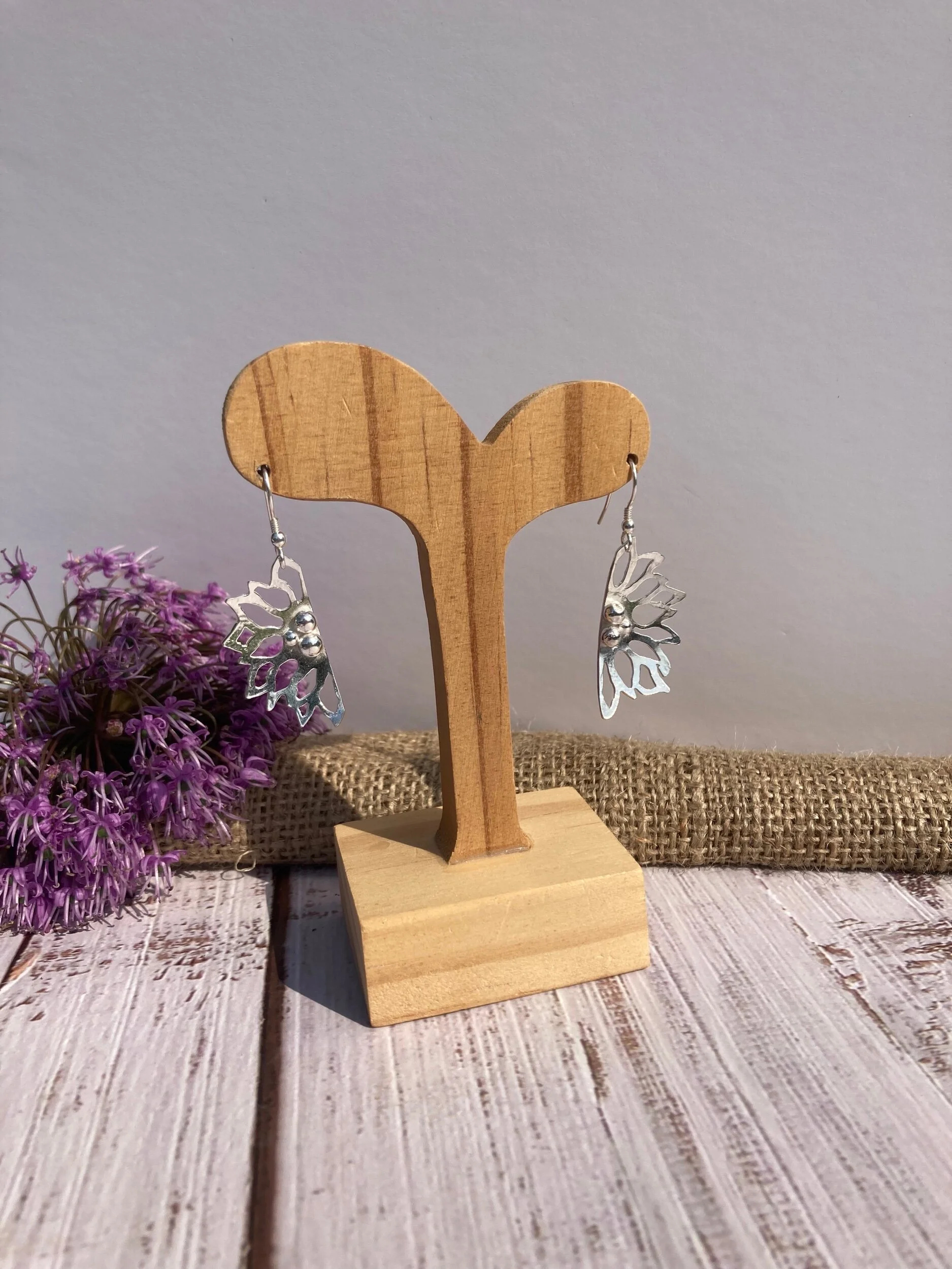 Maisy Eeve designs Intricate half flower drop earring