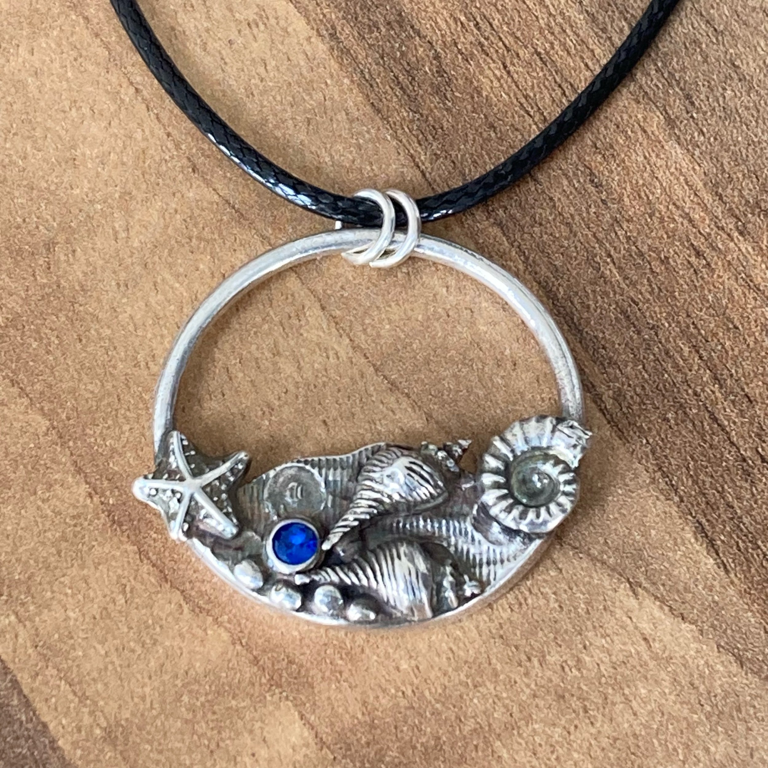 unique shell and seaside themed pendany silver handmade jewellery
