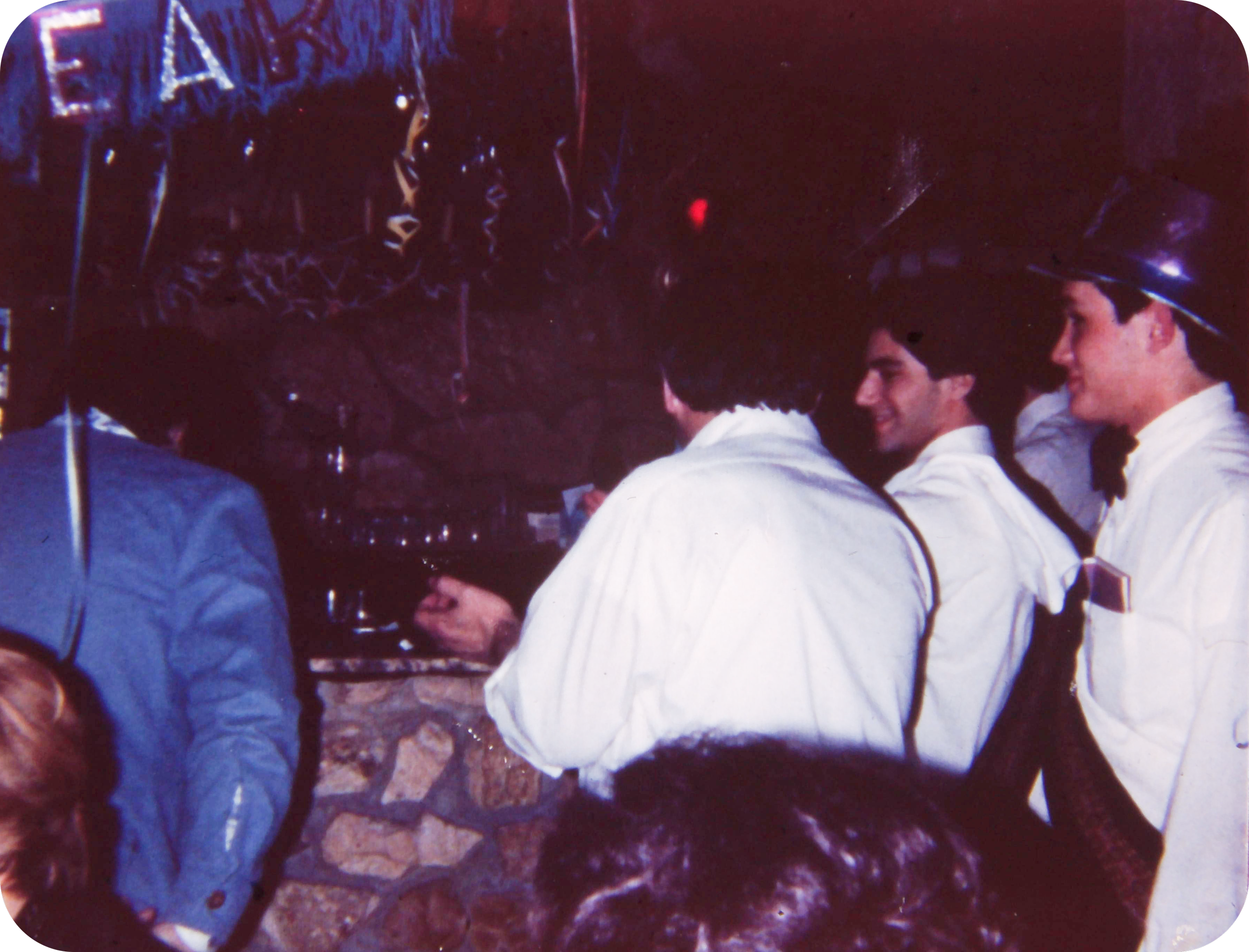 Frank Russo and his son George Russo working together behind the bar at Villa Russo in Richmond Hill, Queens, circa 1980s.