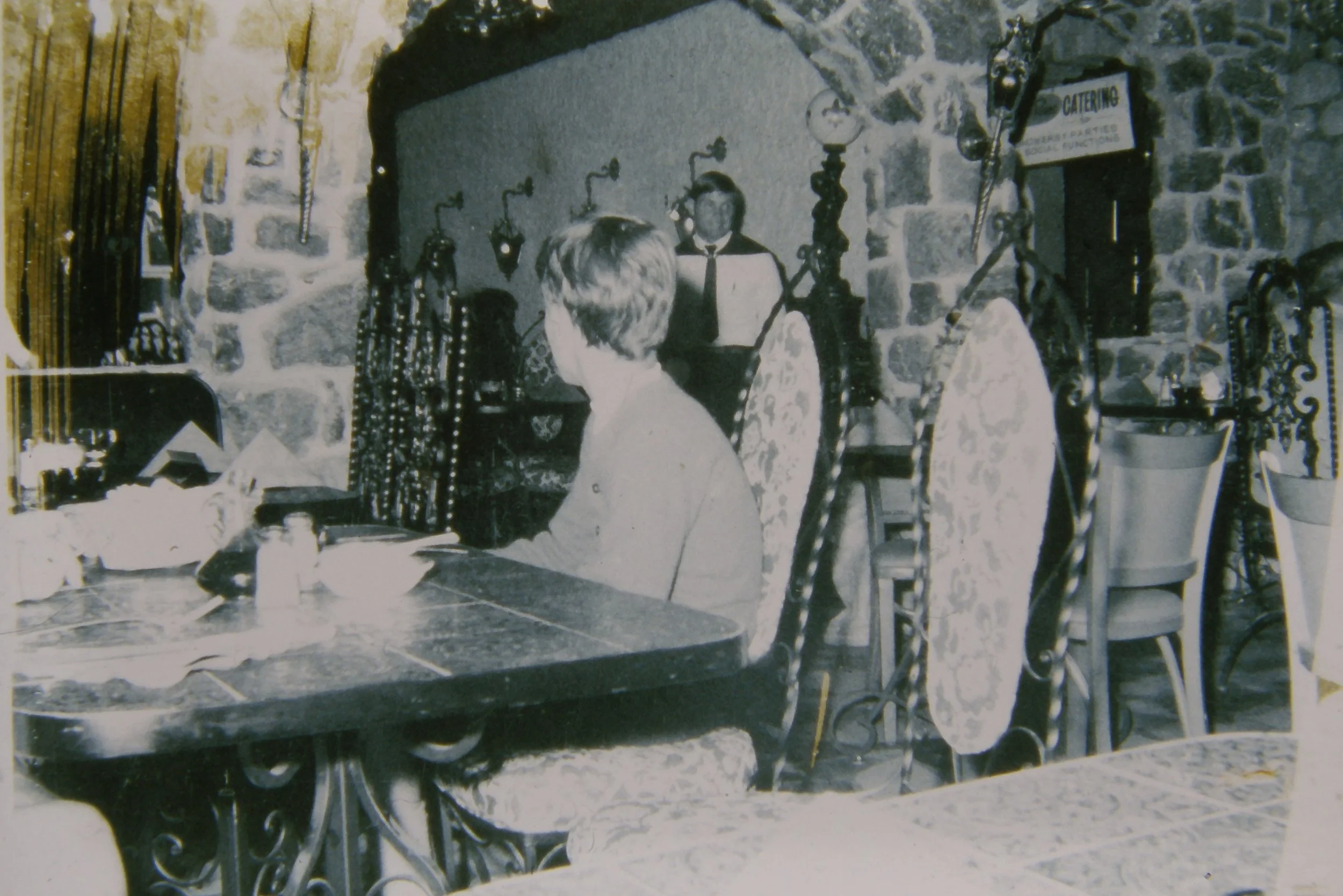 Inside Villa Russo Restaurant, circa 1968, showcasing the original dining room and its distinctive stonework.