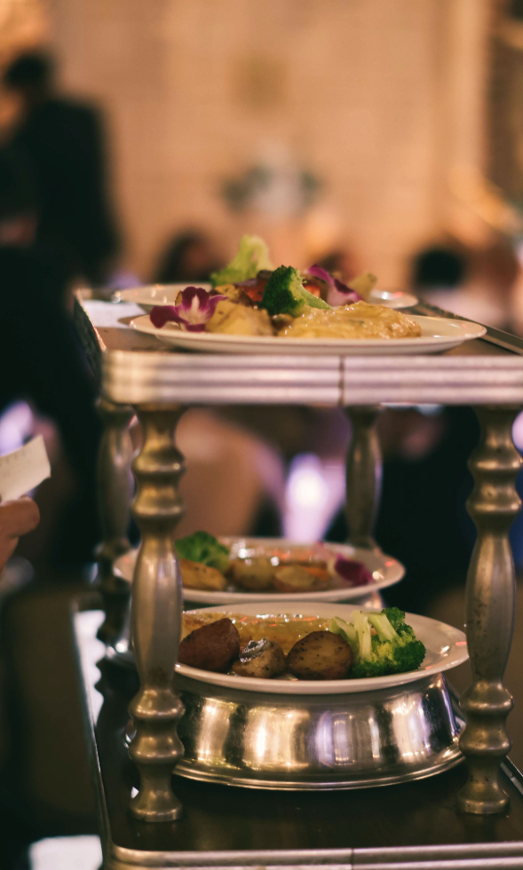 Plated entrées prepared for traditional sit-down dinner service at Villa Russo in Queens, New York.