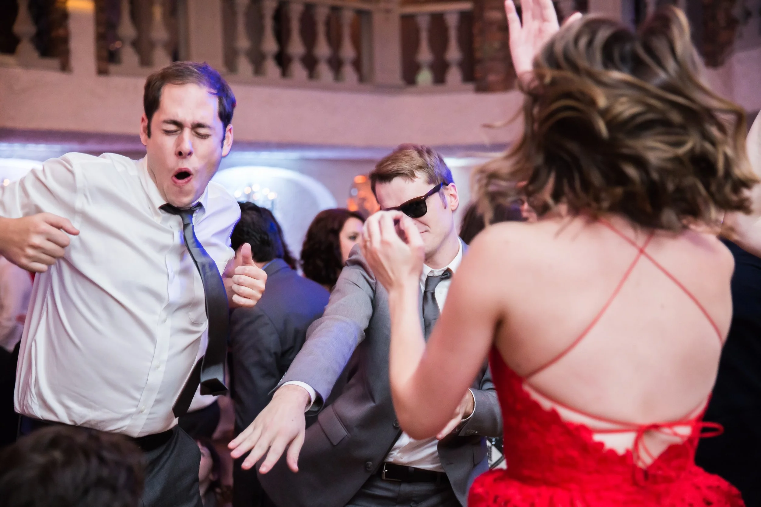 Guests dancing at lively wedding reception with DJ and party atmosphere at Villa Russo Queens NY