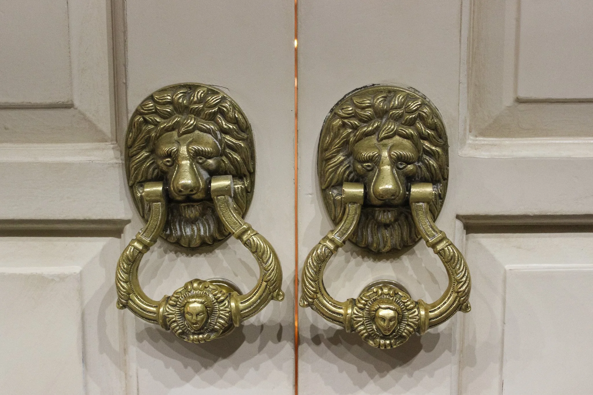 Ornate lion head door knockers at Villa Russo wedding venue in Queens NY