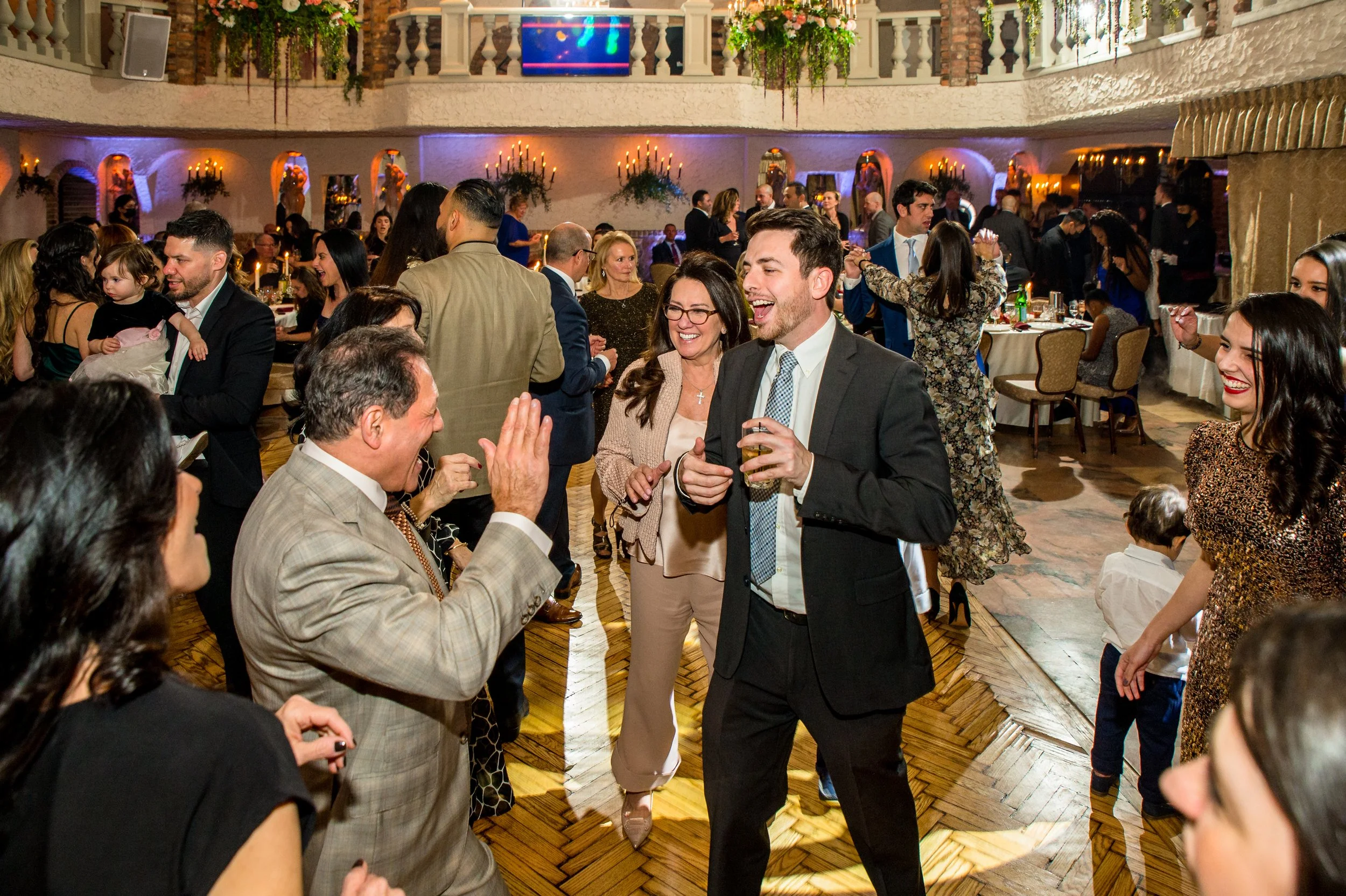 Guests dancing at a wedding reception at Villa Russo catering hall in Queens NY