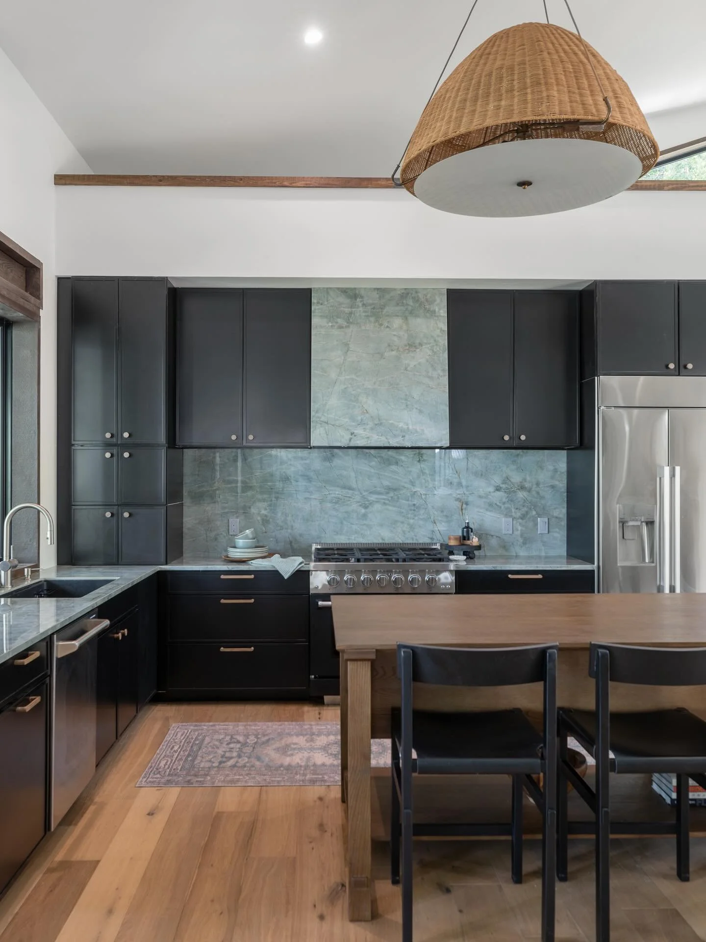 Luxury isn&rsquo;t always loud. Sometimes, it&rsquo;s a deep green stone, warm wood tones, and a layout that invites guests to stay a little longer.

Photo: Josh Johnson Photography
Design and Build: @thelodginglab