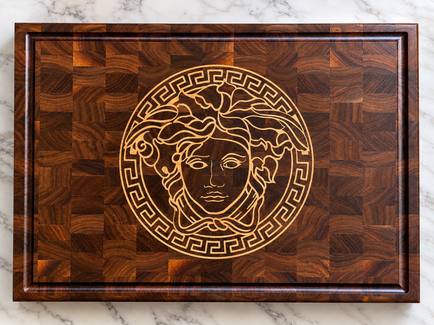Walnut end grain cutting board with maple end grain inlay. 