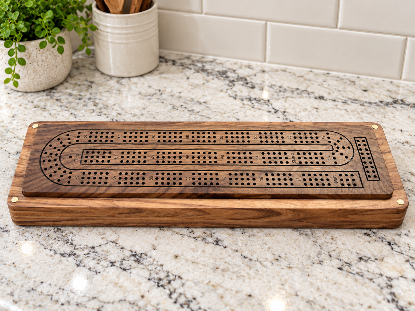 Handcrafted Walnut Cribbage Board in a Modern Kitchen(1).png