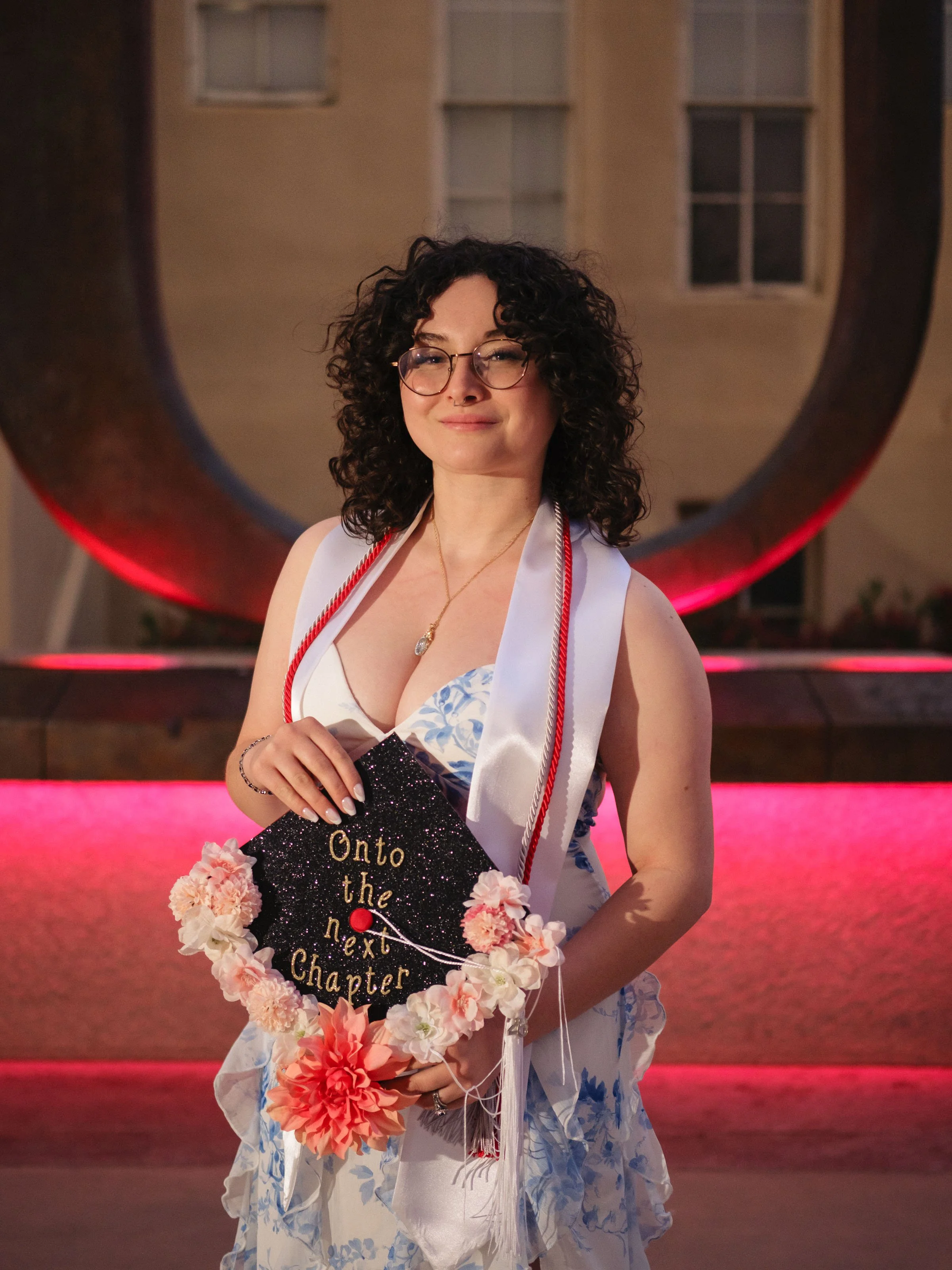 College graduation photographer Albuquerque, beautiful woman UNM graduate, UNM flowers and duck pond photos, UNM graduation photographer
