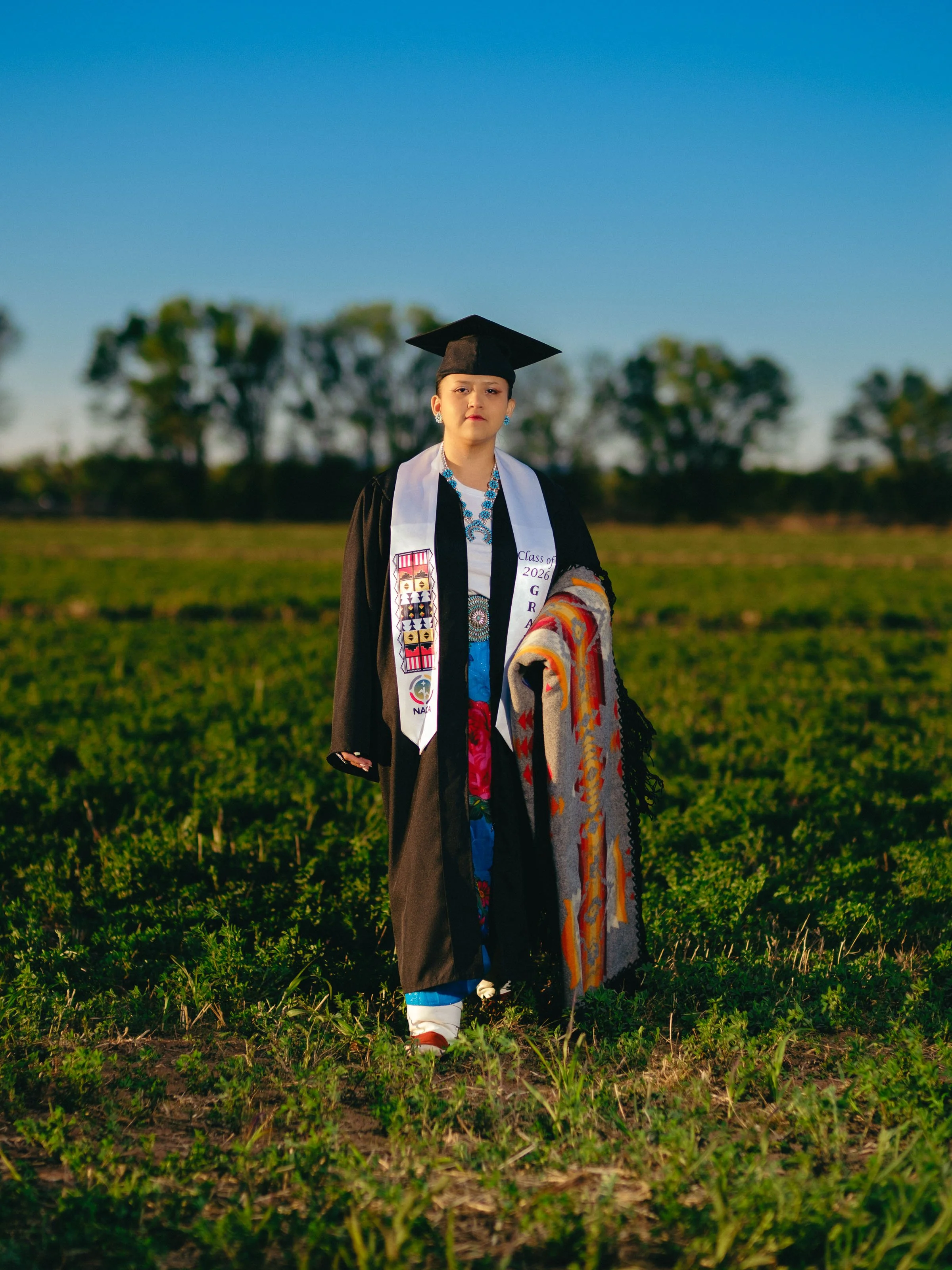 Native American senior photos in New Mexico, Albuquerque senior photography, traditional senior portraits in Albuquerque, Indigenous graduation photos in New Mexico, colorful senior pictures in Albuquerque, cultural senior photo session in New Mexico