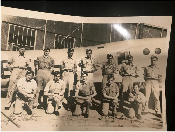 “151247 course 112 Air Bombers Class ‘A’ 17/ 9/‘44” – class photo of 12 men in uniform in front of the fuselage of an aircraft