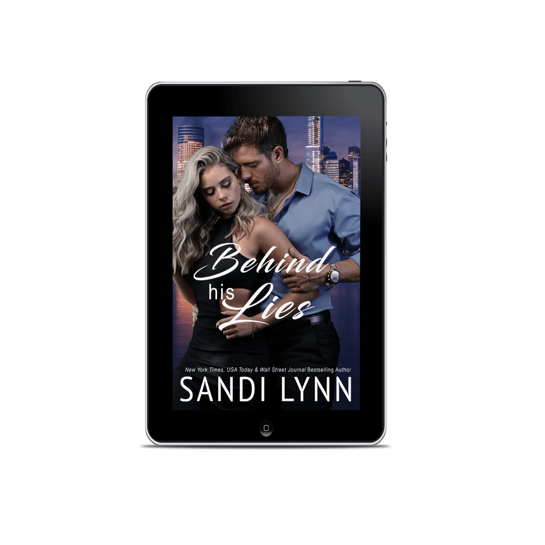 Book cover for 'Behind His Lies' by Sandi Lynn, featuring a man and woman in an intimate pose with a city skyline in the background.
